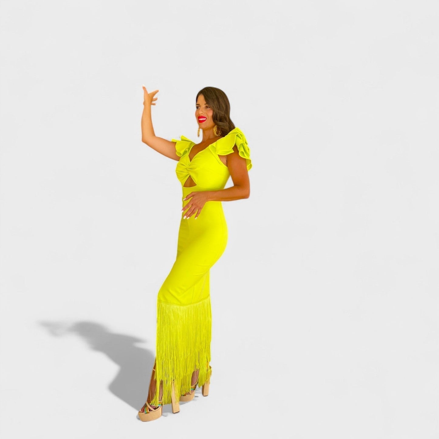 "Lúcia - Neonové flamenco šaty" can be rewritten as "Lúcia - Neonové flamenco šaty s živými barvami".